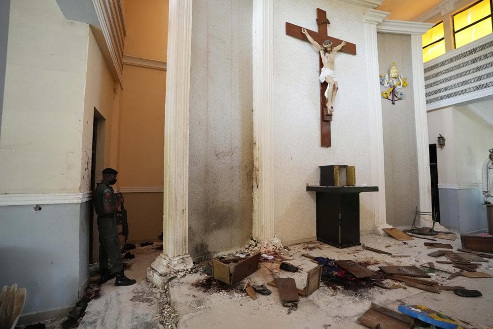 Nigerian forces hunt for gunmen who killed 50 at church