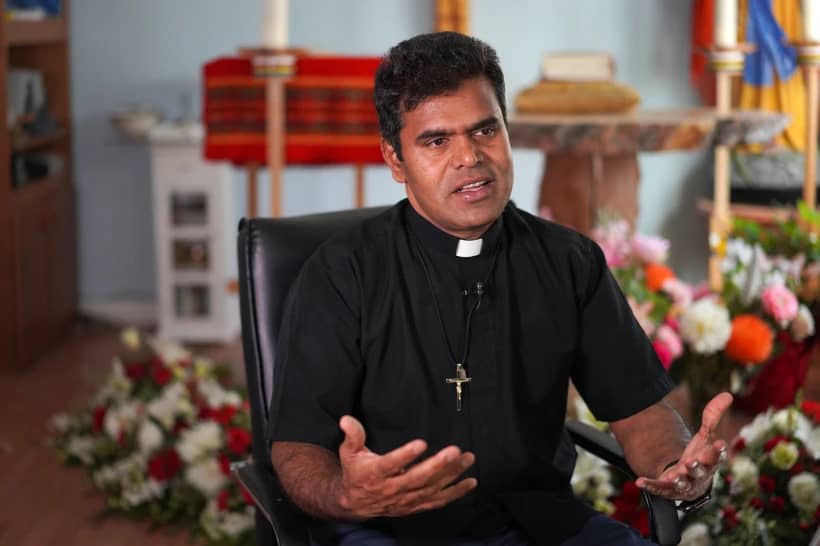 Father Susai Jesu, recently named archbishop of Keewatin-Le Pas, gives an interview at the Sacred Heart Church of the First Peoples where he was once pastor, on Wednesday, July 20, 2022, in Edmonton, Alberta. (Credit: Jessie Wardarski/AP.)