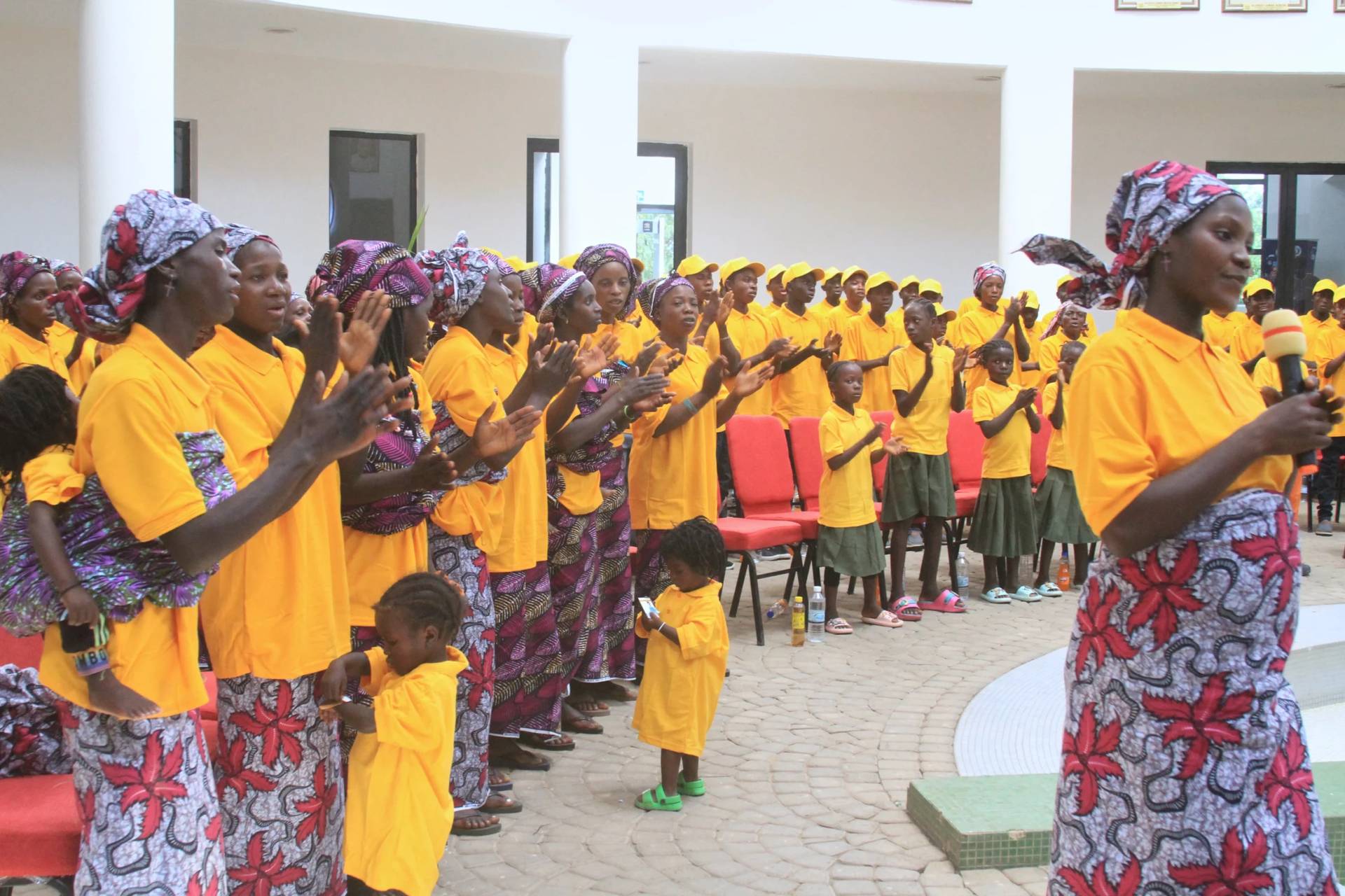 Freed church worshipers who were abducted by gunmen in Kurmin Wali, applaud upon their arrival at the state government house in Kaduna, Nigeria, Thursday, Feb. 5, 2026. (Credit: Abel Omotosho/AP.)