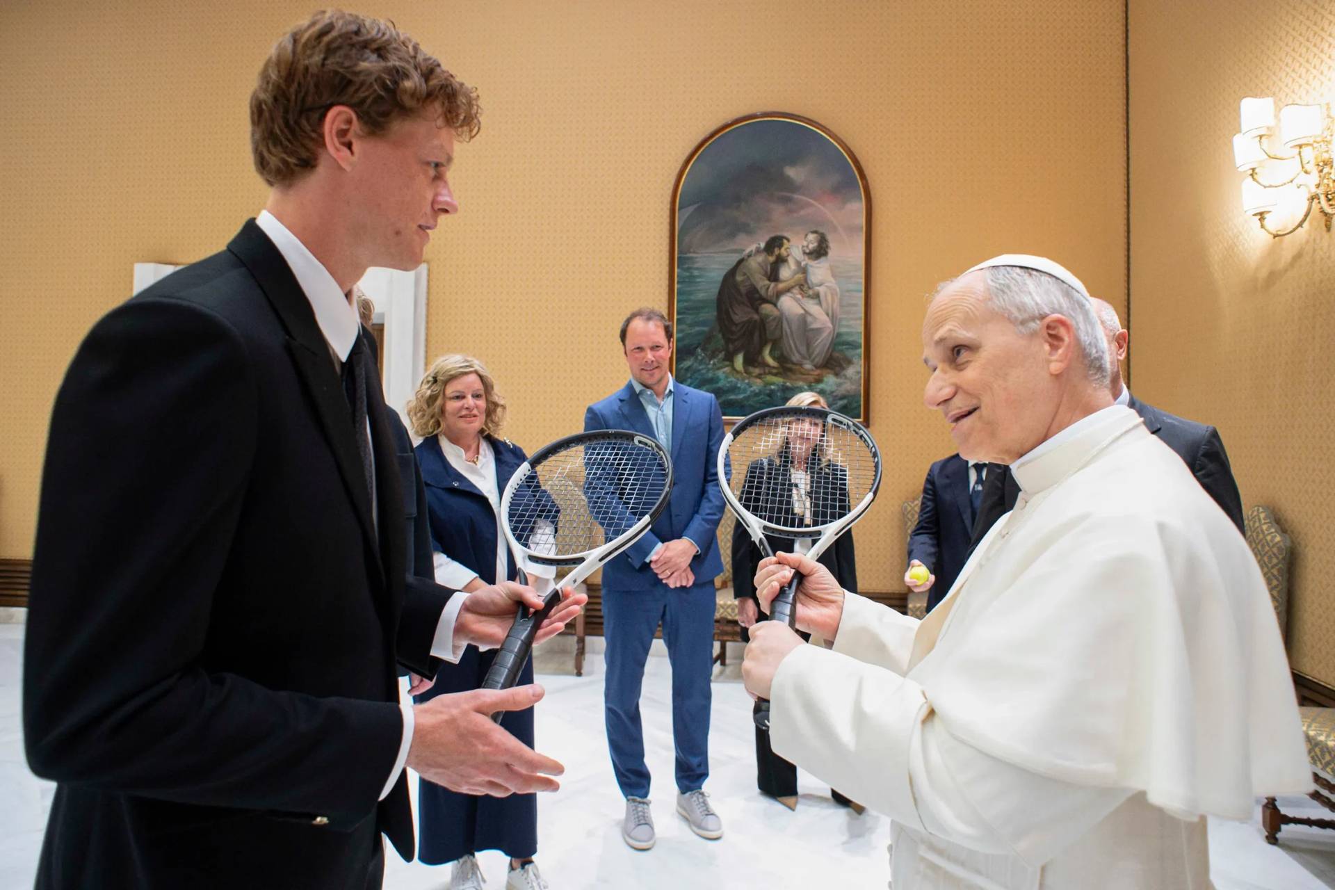 Italy's Jannik Sinner, left, shares a light moment with Pope Leo XIV on the occasion of their meeting at the Vatican, Wednesday, May 14, 2025. (Credit: Vatican Media via AP.)