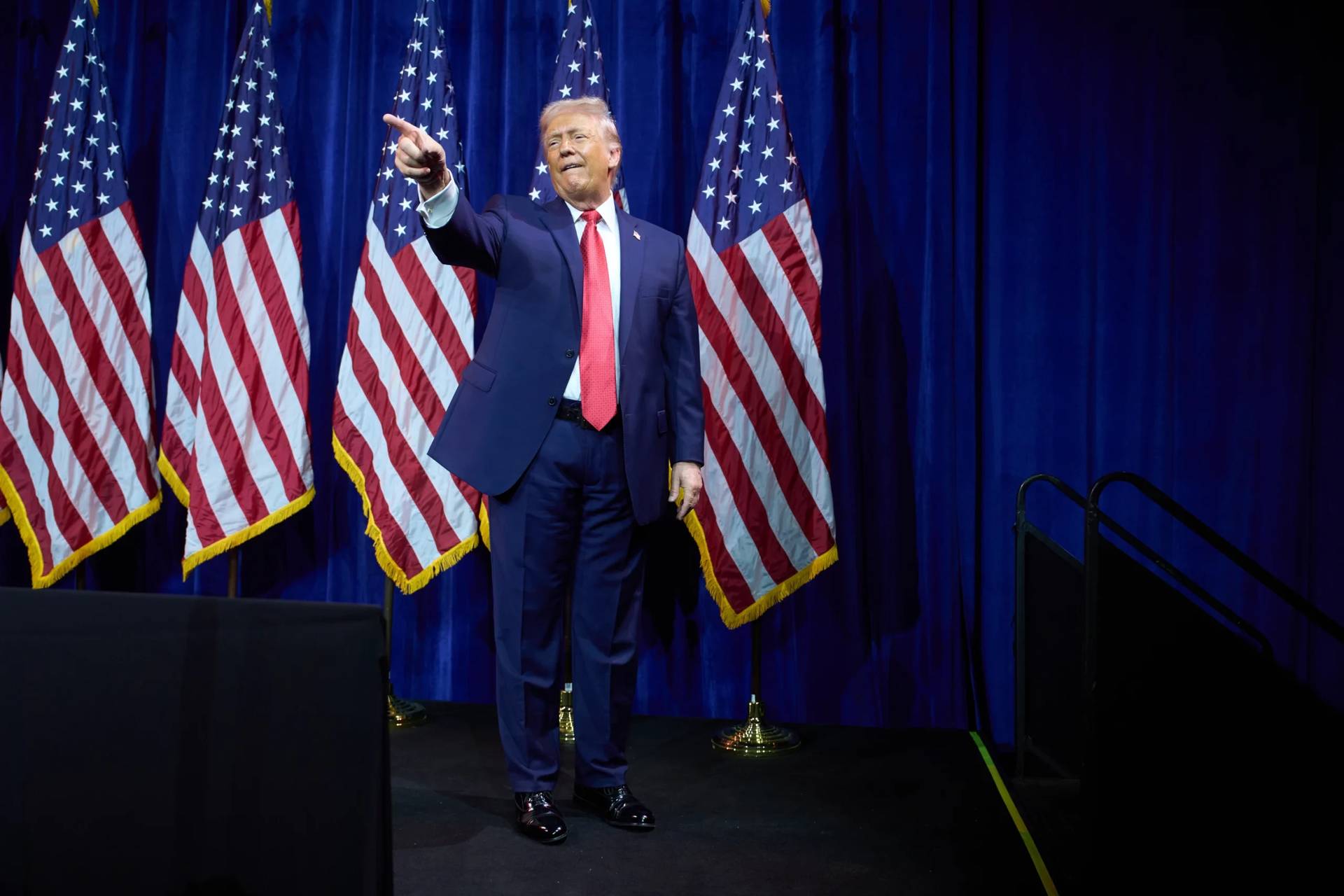 President Donald Trump points to the crowd after speaking to House Republicans in Washington, DC, on Jan. 6, 2026. (Credit: Evan Vucci/AP.)