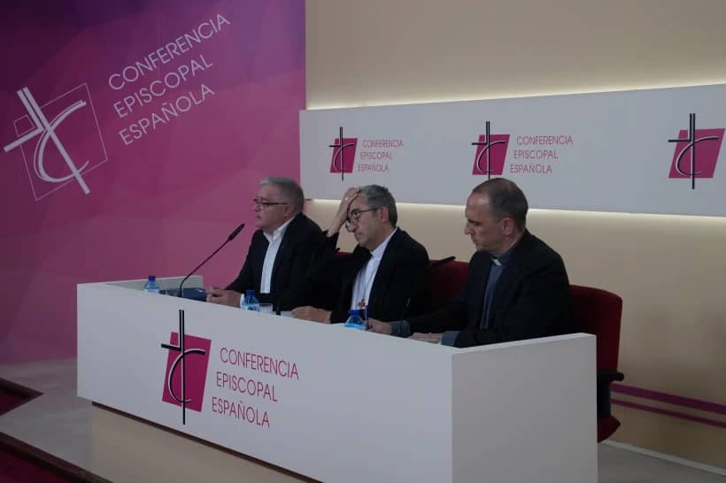 The president of the Spanish Episcopal Conference, Luis Arguello, centre and Jesus Diaz Sariego, President of Spain’s Conference of Religious Orders, left, take part in a press conference in Madrid, Spain, Tuesday, July 9, 2024. (Credit: Paul White/AP.)