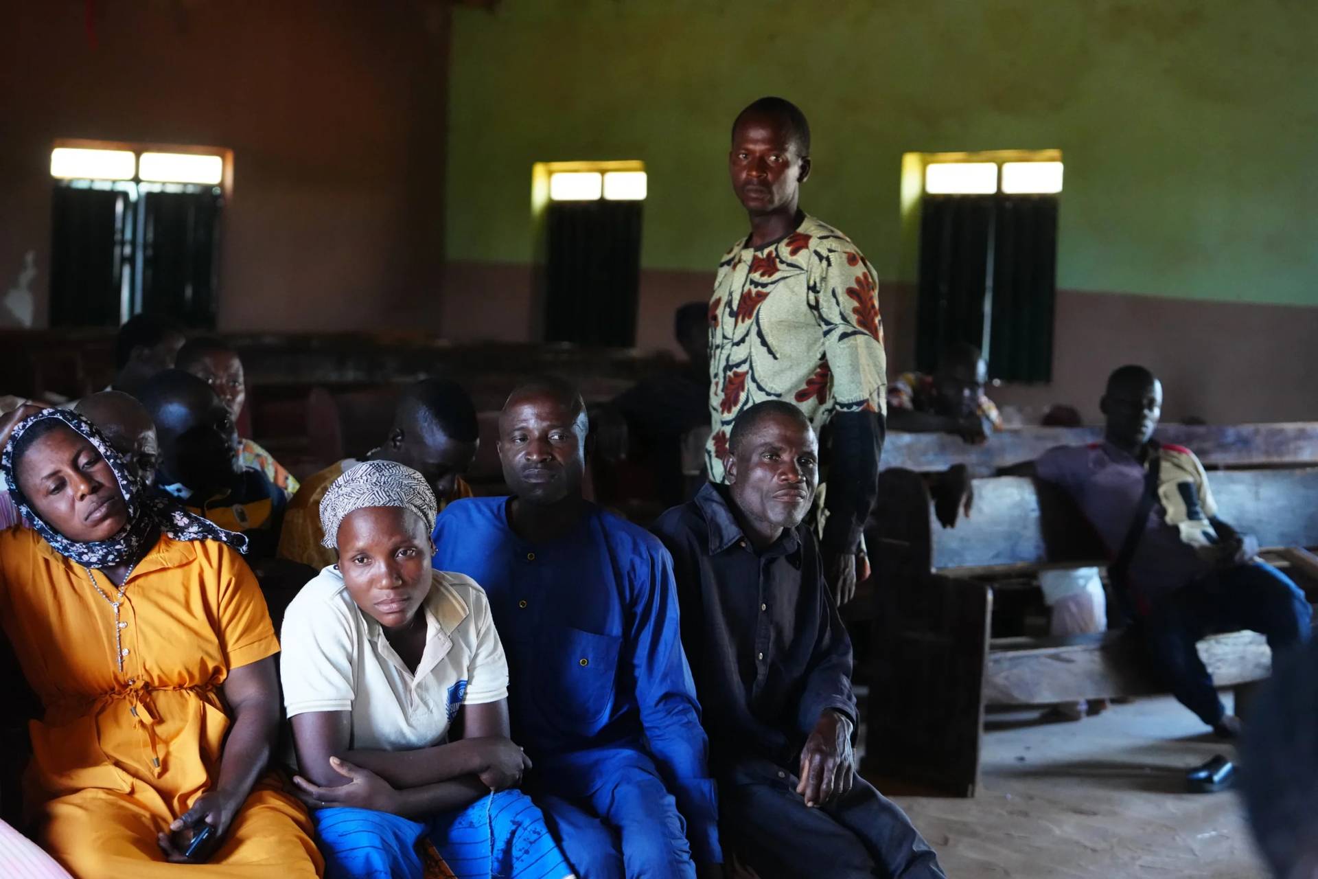 Baptist Reverend Micah Dulus speaks with church members in Kaduna, Nigeria, on Nov. 6, 2025. (Credit: Sunday Alamba/AP.)