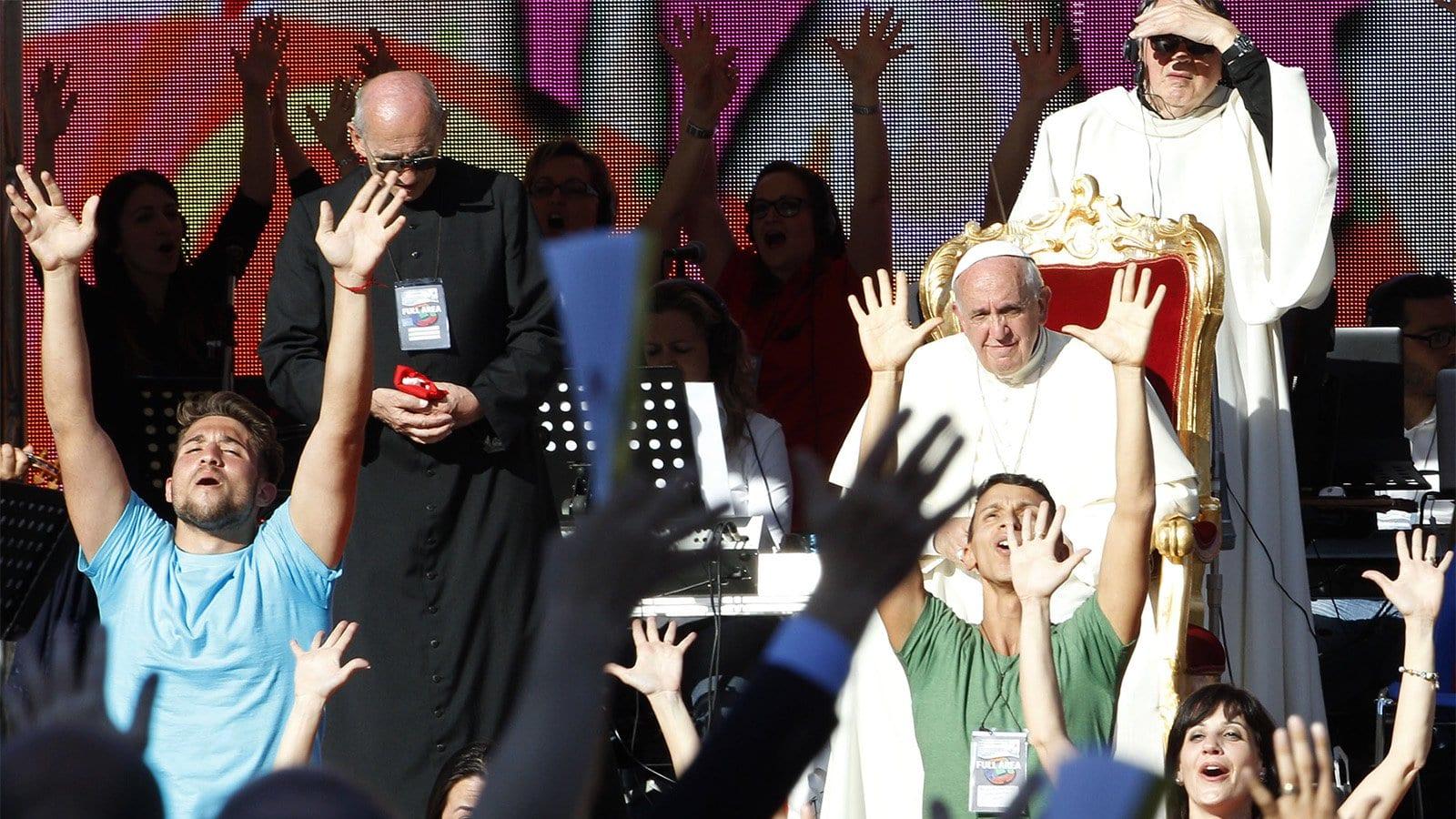 Who are Catholic charismatics and what’s a covenant community?